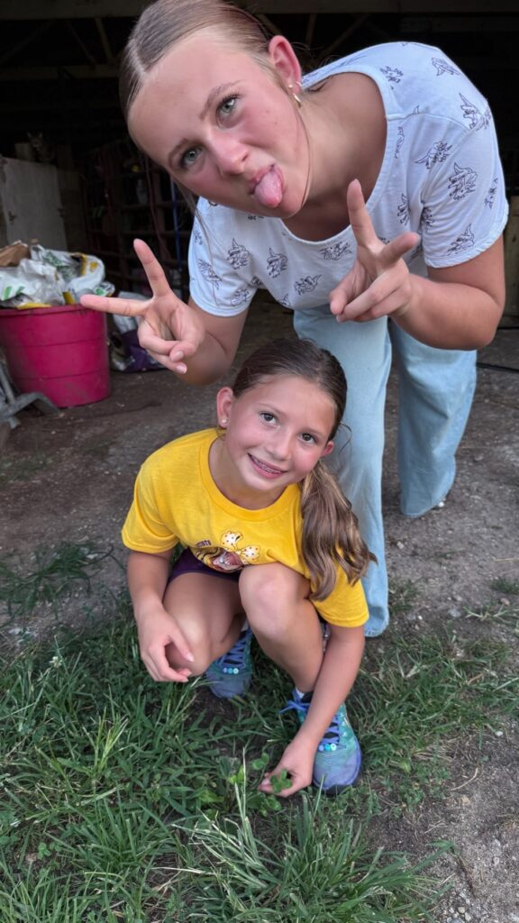 Poppy Mixon and her family working together on her steer project